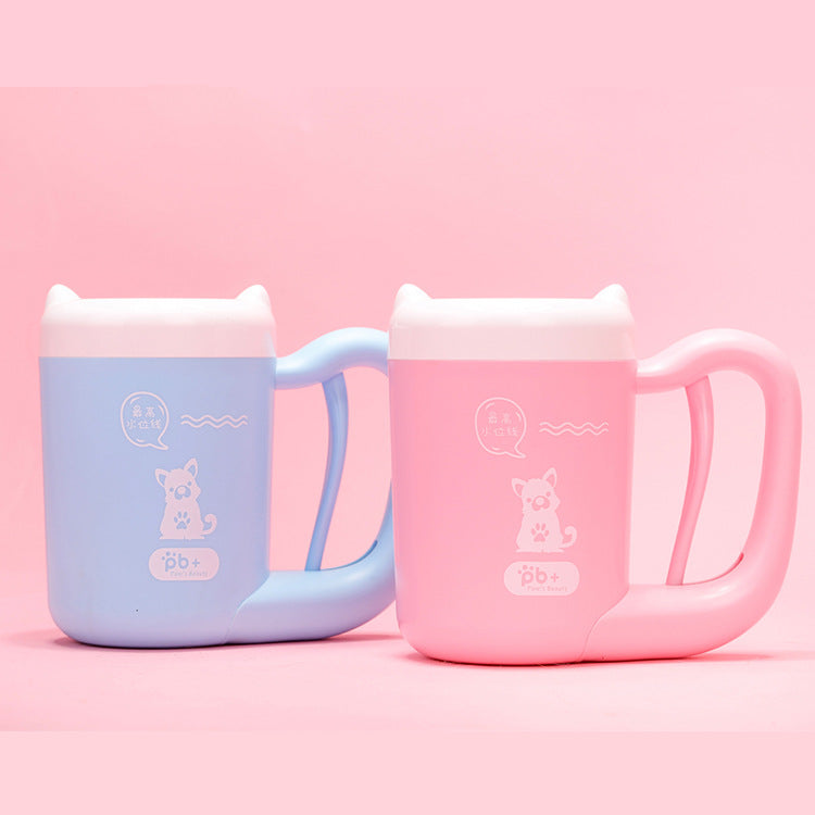 Two pink and blue mugs with cat designs on a pink background