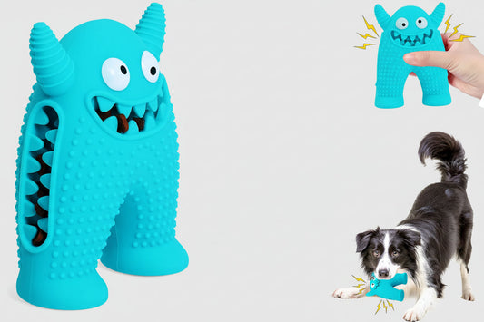 Blue monster-shaped dog toy with a dog playing with it